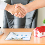 hands agent client shaking hands after signed contract buy new apartment